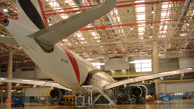 Technicians preparing an Airbus aircraft for certified Permagard paint protection application in a controlled facility
