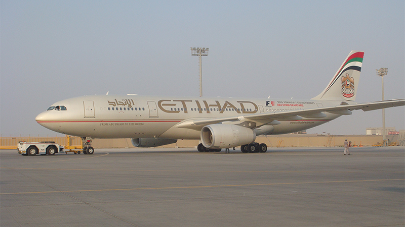 Etihad Airways Airbus featuring certified Permagard paint protection with a glossy, protected finish on the runway